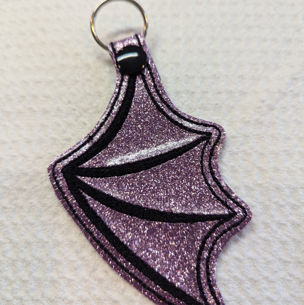 Embroidered vinyl batwing keychain